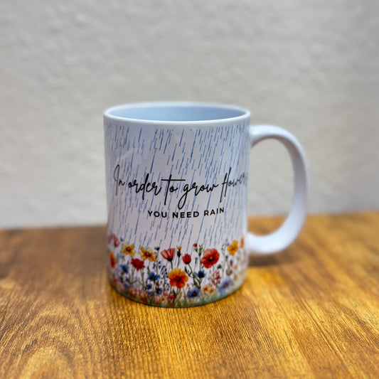 In order to grow flowers you need rain, Mug